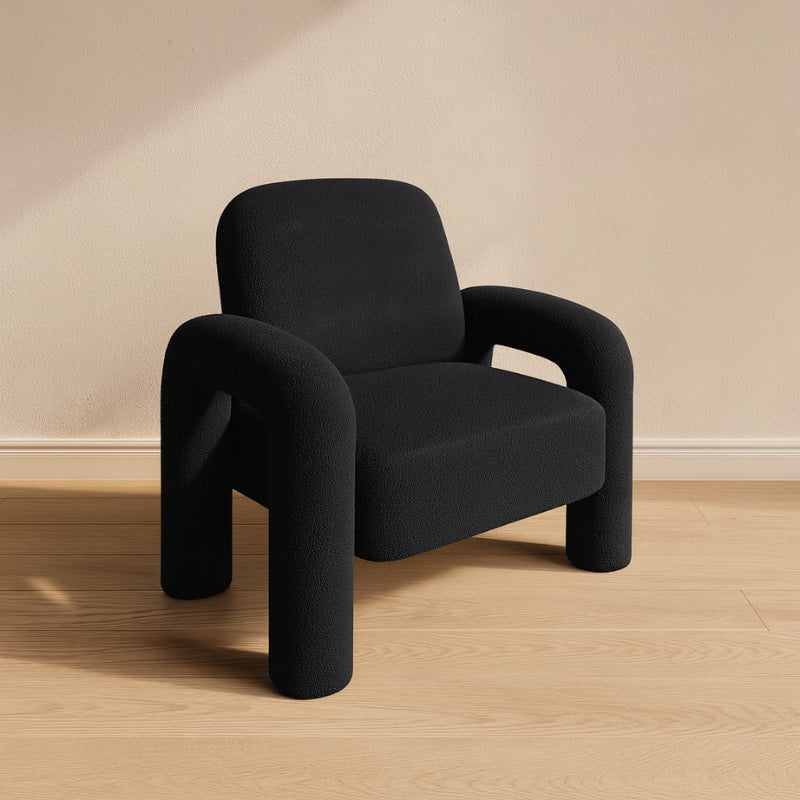 Black Fluffy office Chair on a wooden floor with a beige wall background