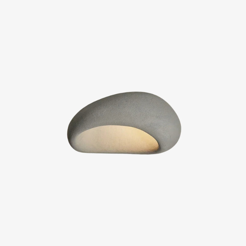 Cylindrical light fixture gray with a textured surface on a white background
