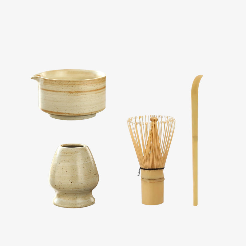 bamboo whisk and bowl on a white background