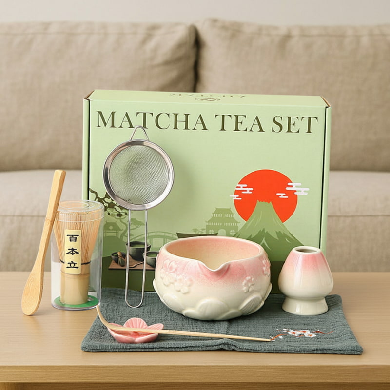best matcha sets ceramic with a green box featuring Mount Fuji on a wooden table.