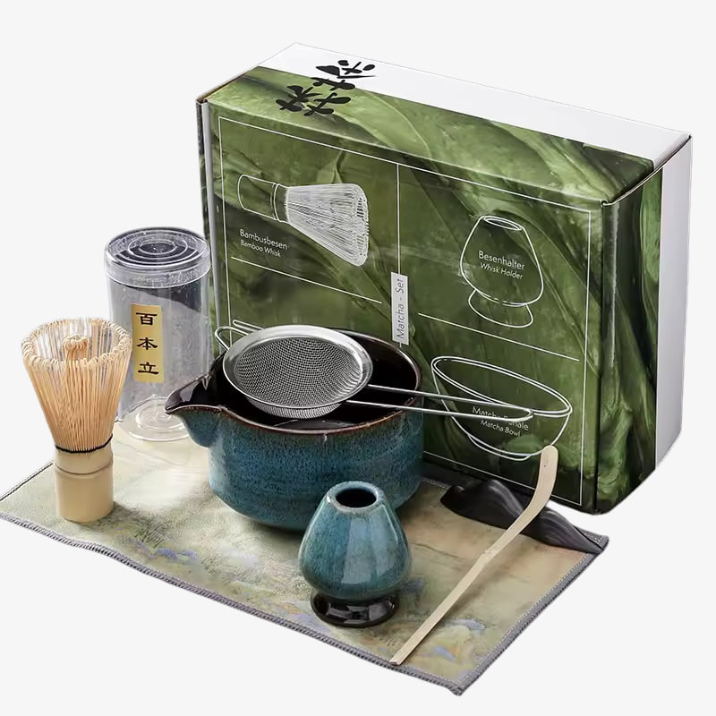blue japanese tea set with green packaging on a white background
