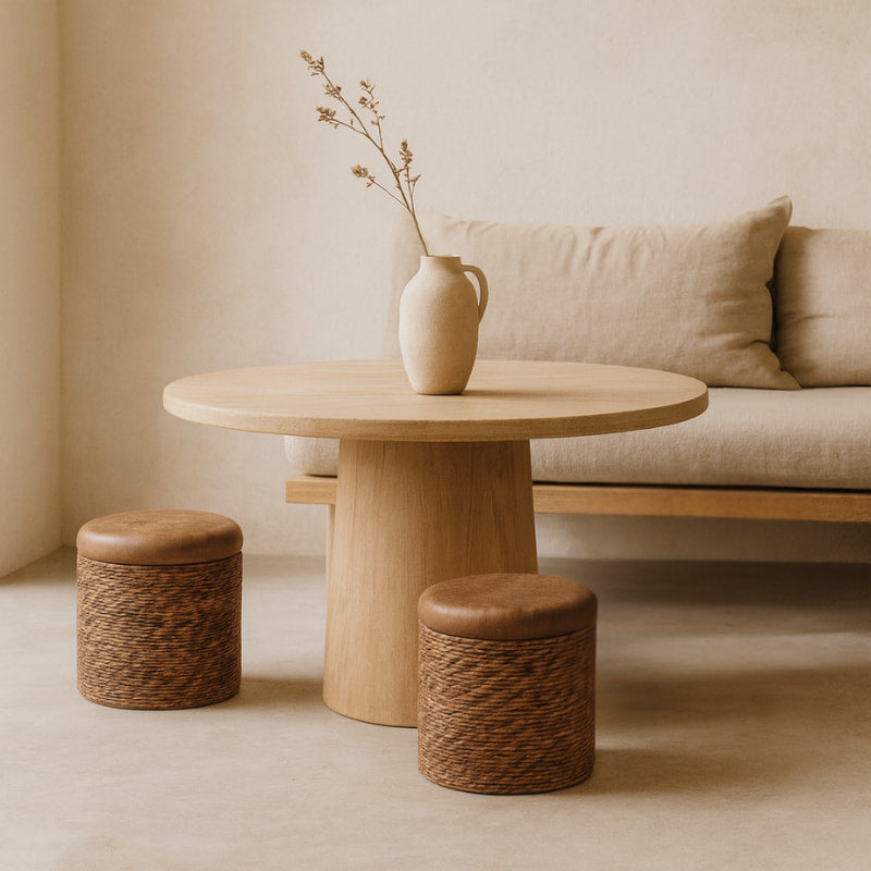 Two brown rattan ottoman on a white background.