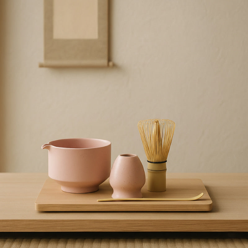 ceramic tea bowl designs and tea-making tools on a wooden stand against a beige wall.