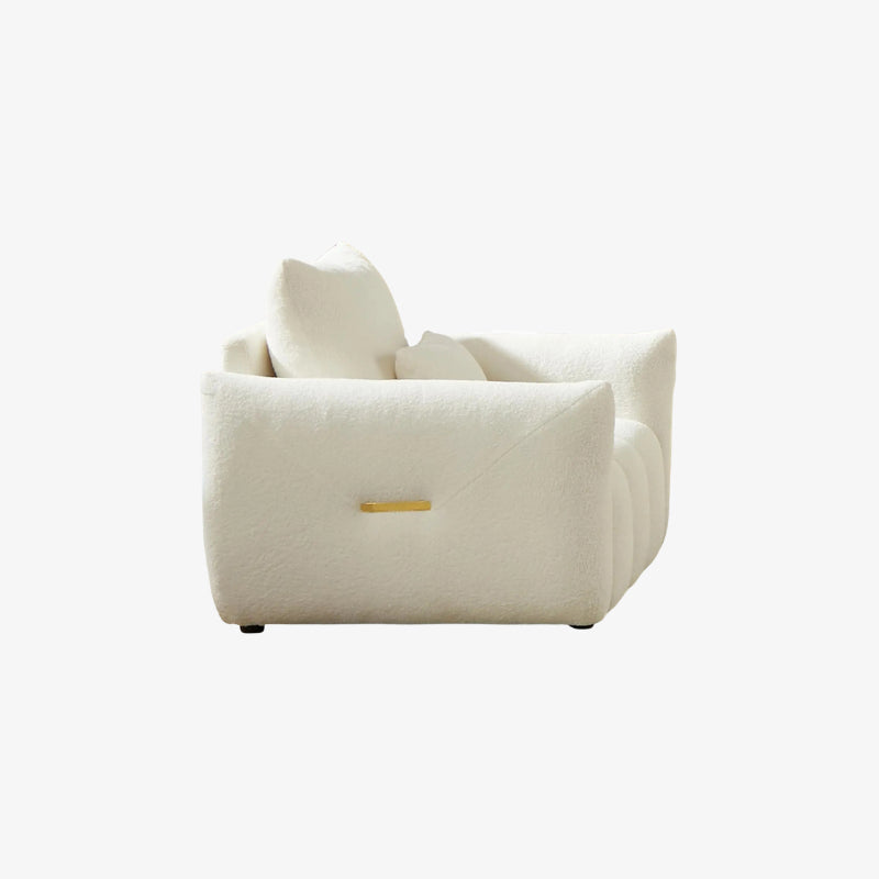 White textured cloud sofa chair with a small logo on a white background