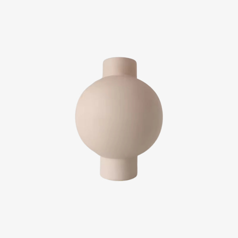Beige designed vase on a white background