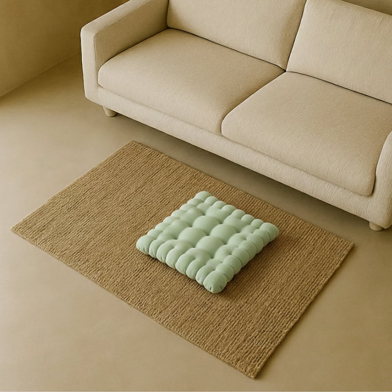 designers guild nabucco cushions and a sofa in a wabi sabi living room