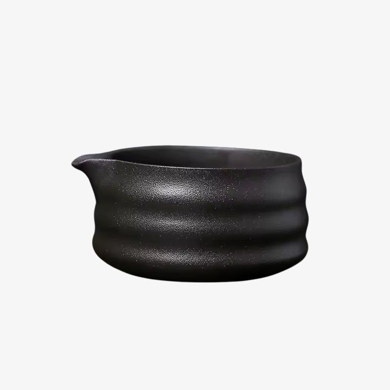 Black encha matcha tea ceramic pot with ribbed design on a white background