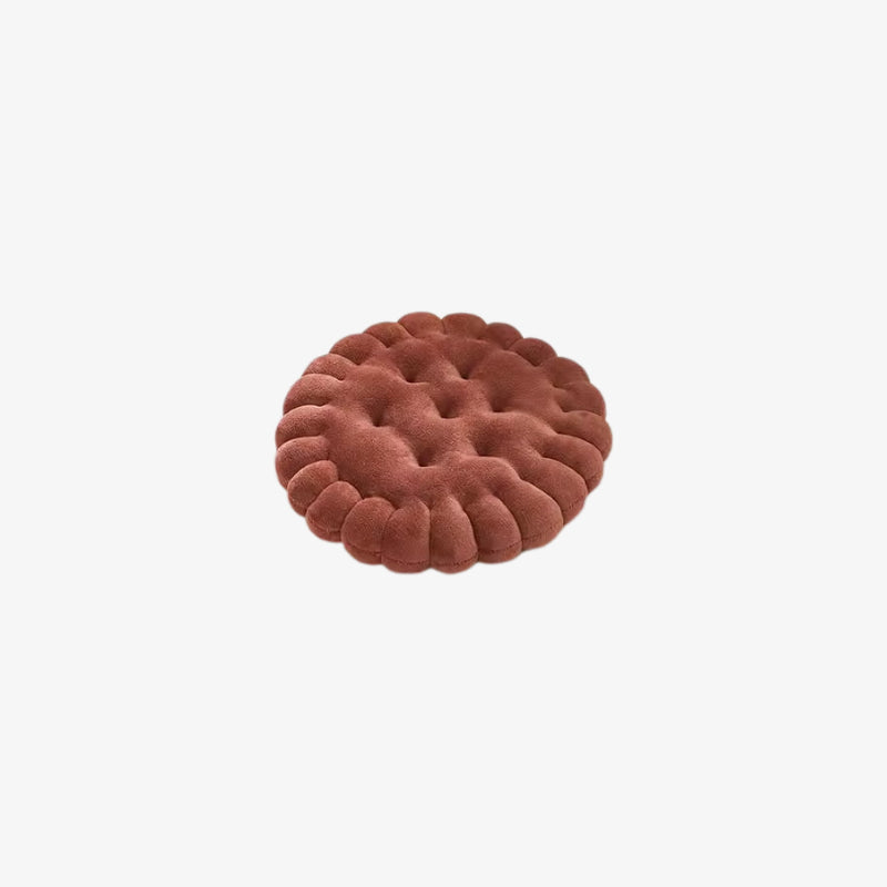 Round, floor pillow cushion in a rust color on a white background
