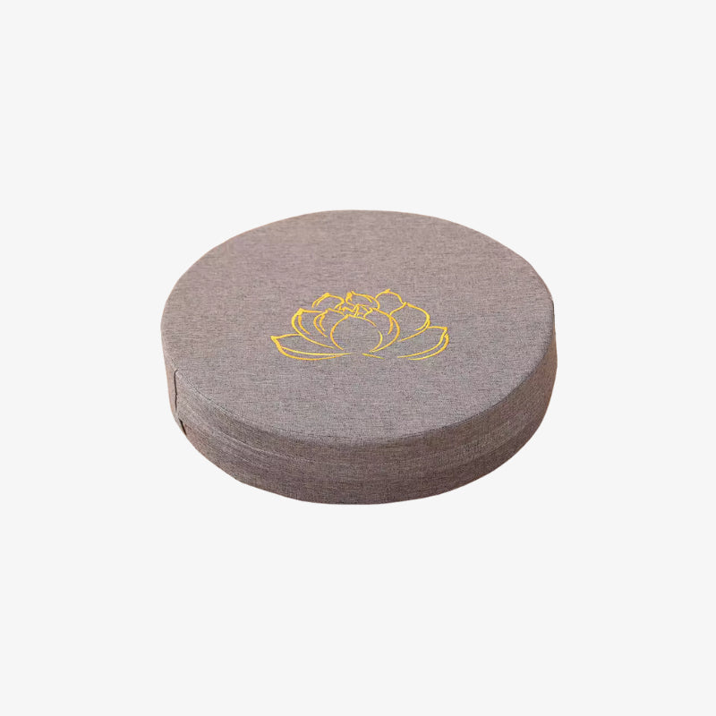 in harmony meditation cushion with yellow lotus design on a white background