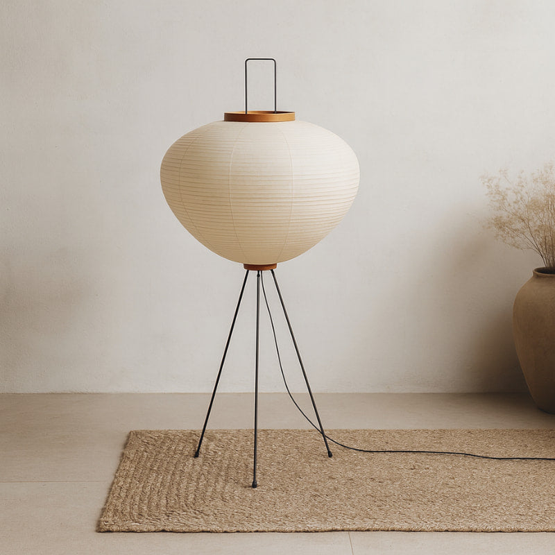 Beige japandi floor lamps on a beige rug in a minimalistic room.