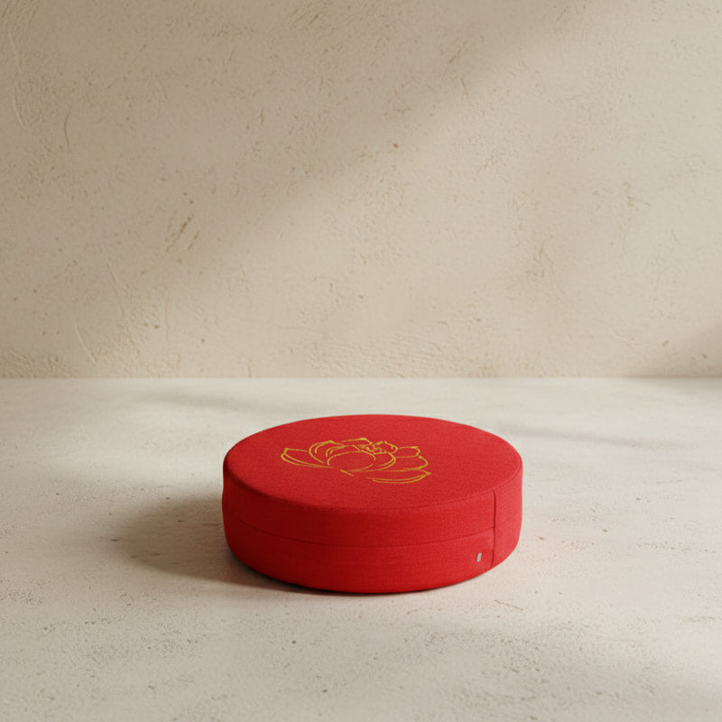 Red lotus designs yoga cushions on a beige background