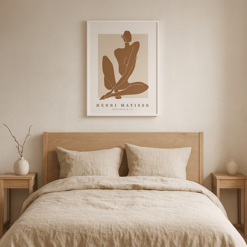 Beige bedroom with a bed, side tables, and a Henri Matisse modern prints wall art