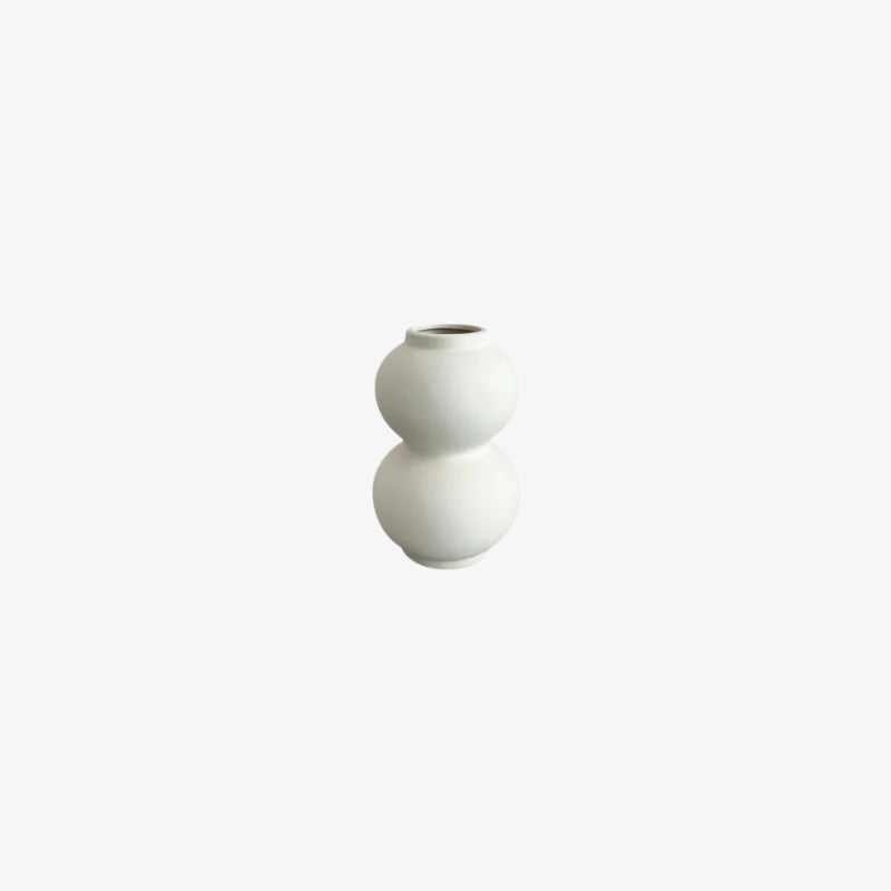White plant ceramic pot on a white background