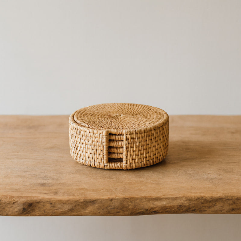Rattan coaster on a wooden surface with a neutral background