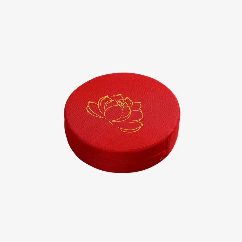 Red floor cushions with gold lotus design on a white background