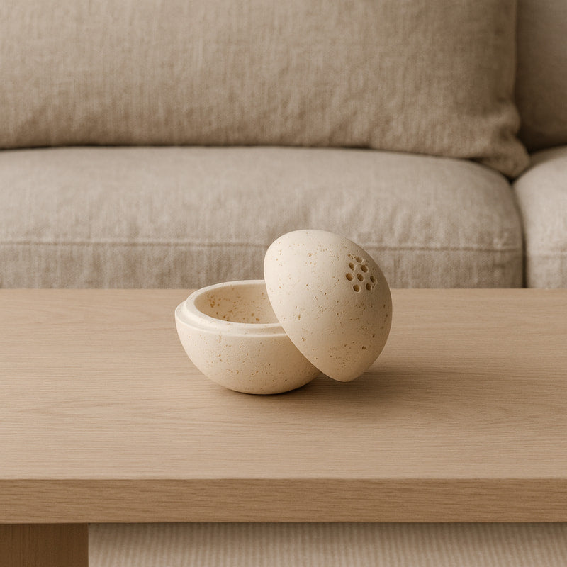 stoner incense burner on a wooden table in a living room.