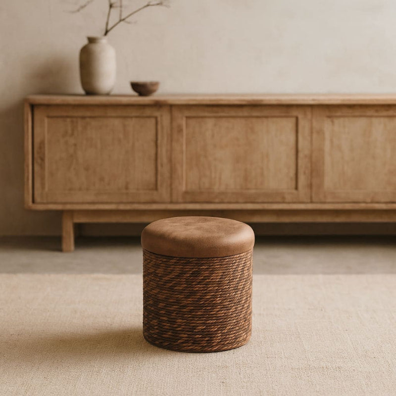 Wabi sabi brown ottoman in a living room.