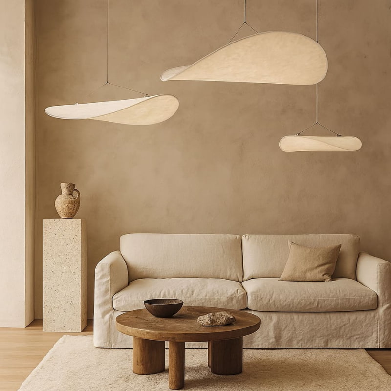 Beige sofa with wooden coffee table and wabi-sabi modern dining furniture new york in a room with beige walls.