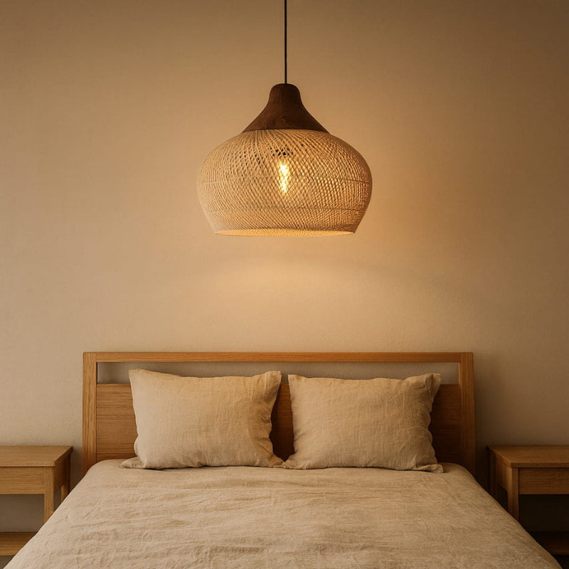 Bedroom with wooden headboard, beige bedding, and wabi sabi night light wicker.