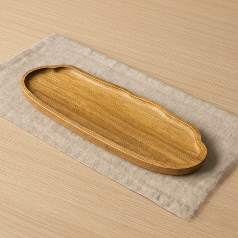 Wooden wabi sabi tray on a beige surface