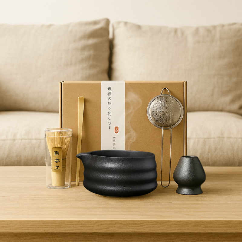 Twhere to buy matcha set near me with black teapot, glass, and other accessories on a wooden table.