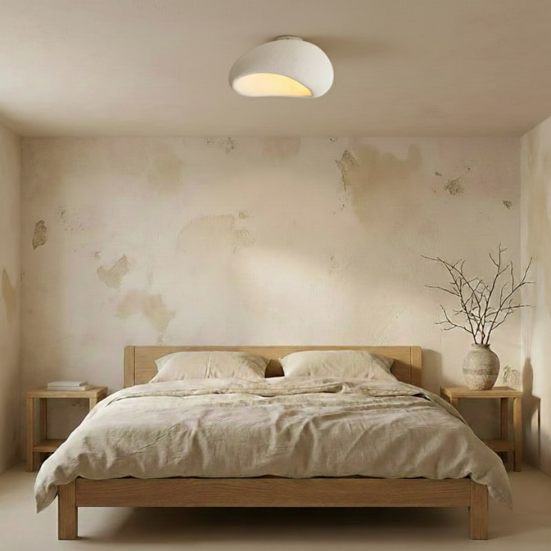 Bedroom with wooden bed and white ceiling lamp round.