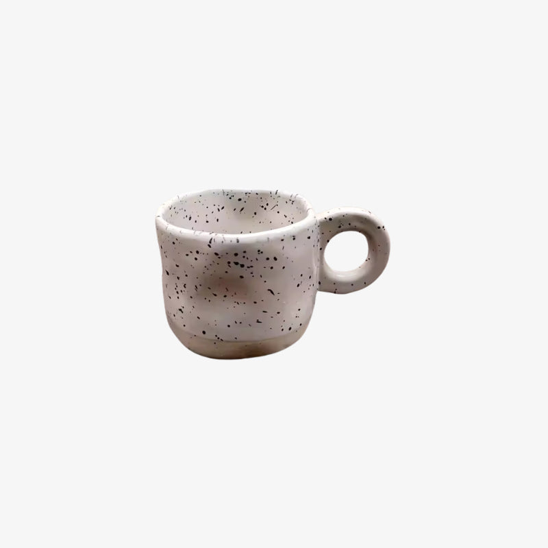 white ceramic coffee cup on a white background
