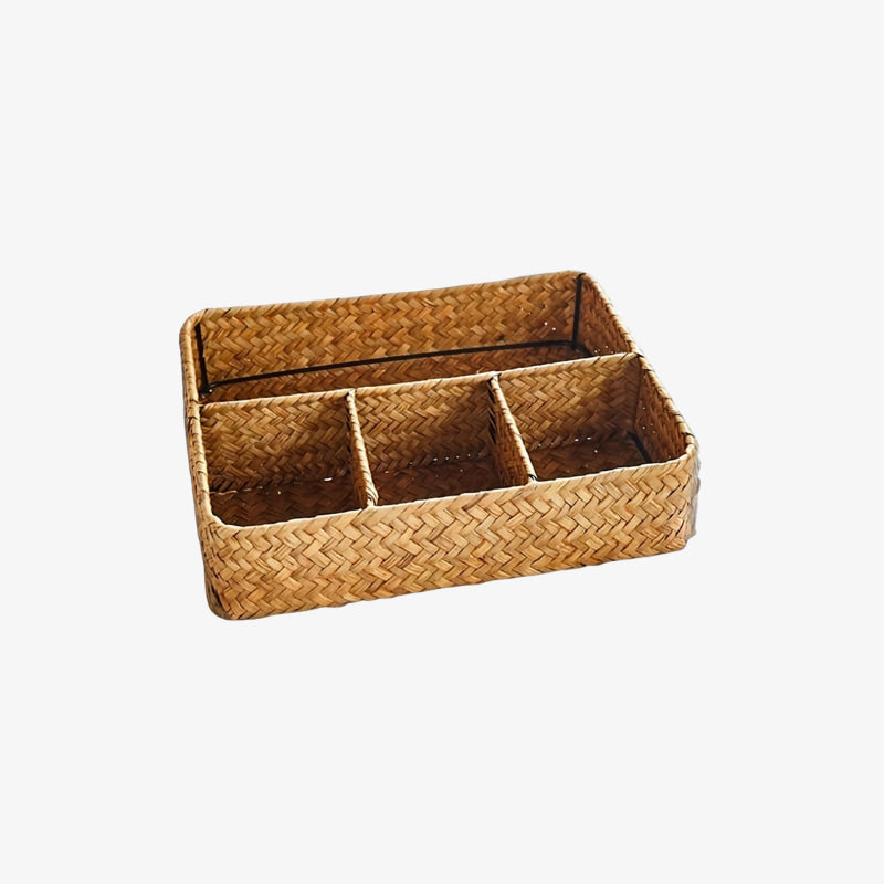 wicker storage basket with compartments on a white background