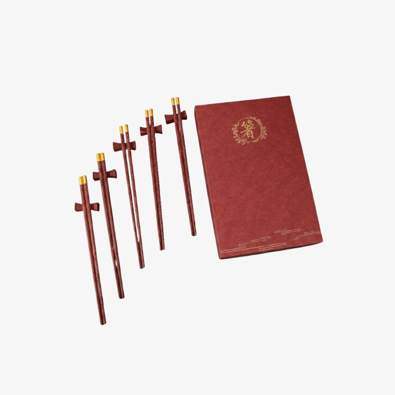 Set of wooden chopsticks with wooden chopsticks box on a white background