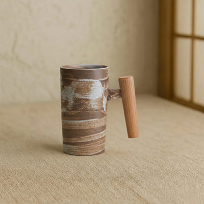 Ceramic Mug With Handle in a wabi sabi room.