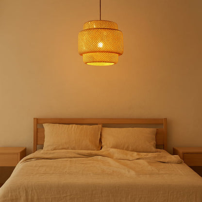 Bedroom with wooden headboard, beige bedding, and a Japandi Style Lighting.