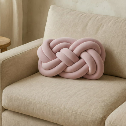 Knit Decorative Pillows on a beige sofa against a beige wall