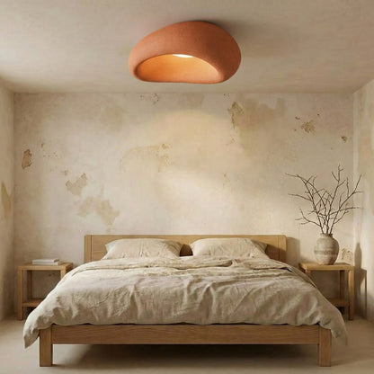 Bedroom with wooden bed, bedside tables, and a Nordic Ceiling Lamp.