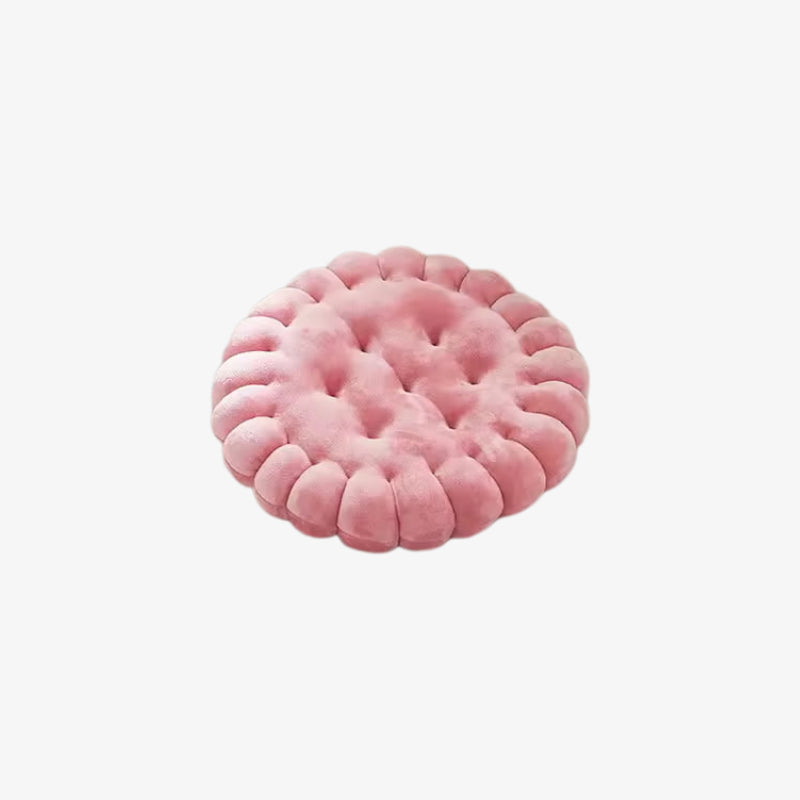 Pink textured cushion on a white background