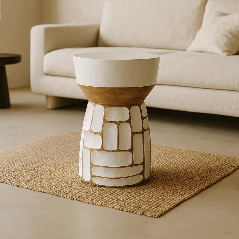 Wabi Sabi Hand Painted Stool in a living room with beige sofa.