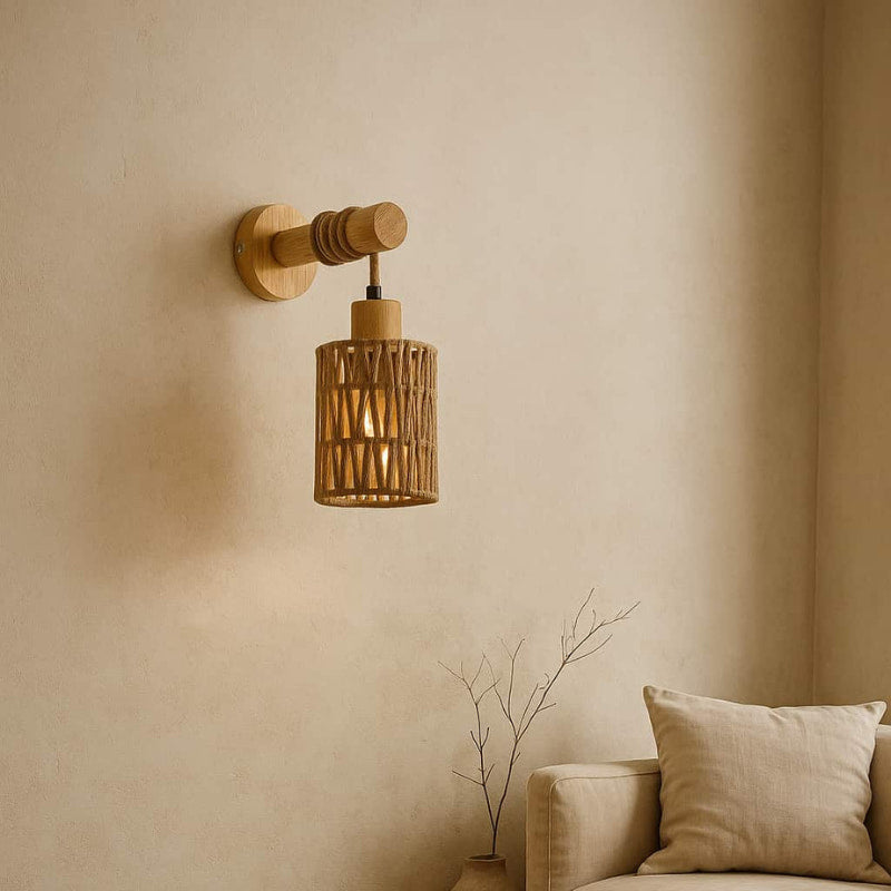 Wabi Sabi Wall Lamp on a beige wall with a couch and plant in the background