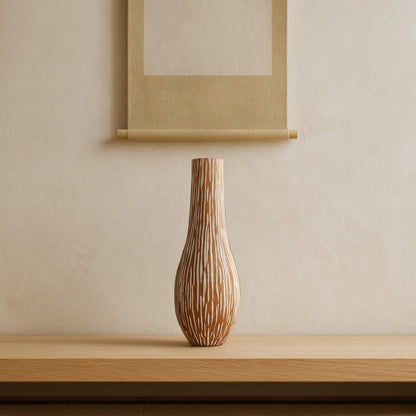 Wabi Sabi Wood Vase with a beige wall and framed artwork in the background
