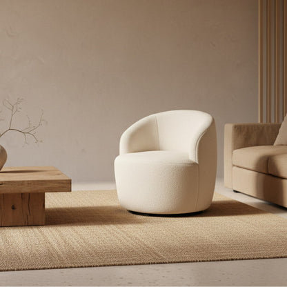 White Boucle Swivel Chair in a minimalistic room with a stone sculpture on a shelf.