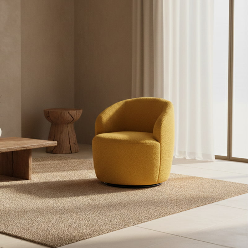 Yellow swivel chair in a minimalistic room with a textured wall and stone sculpture.