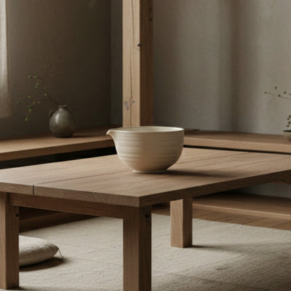 Wooden table with a authentic japanese matcha bowl​ on a neutral background