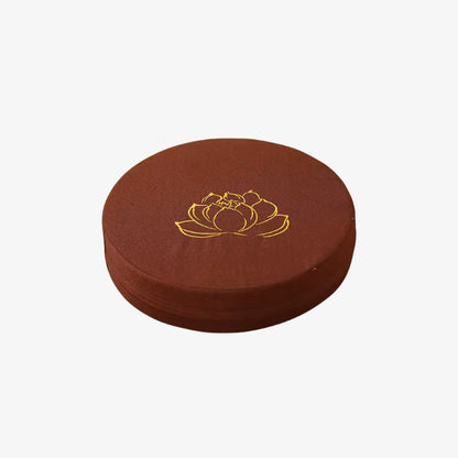 big floor cushion​ with a gold lotus design on a white background