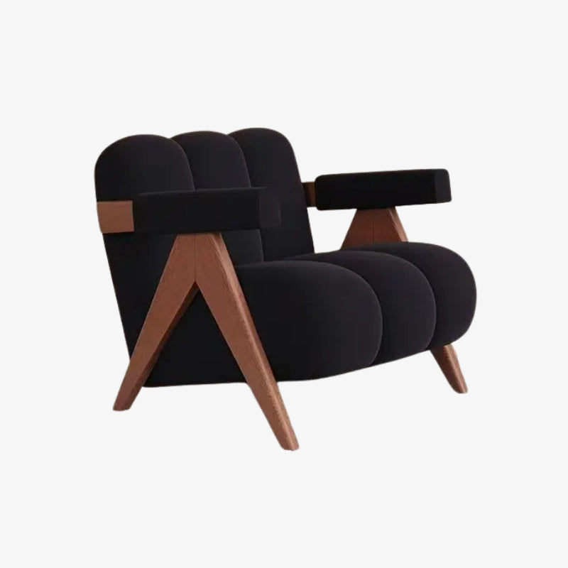 Black modern armchair with wooden legs on a white background