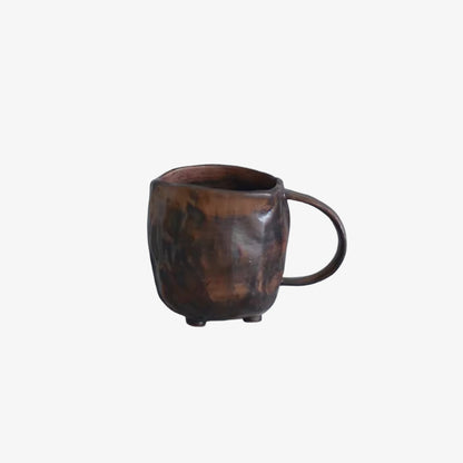 Brown tea cup wabi sabi on a white background