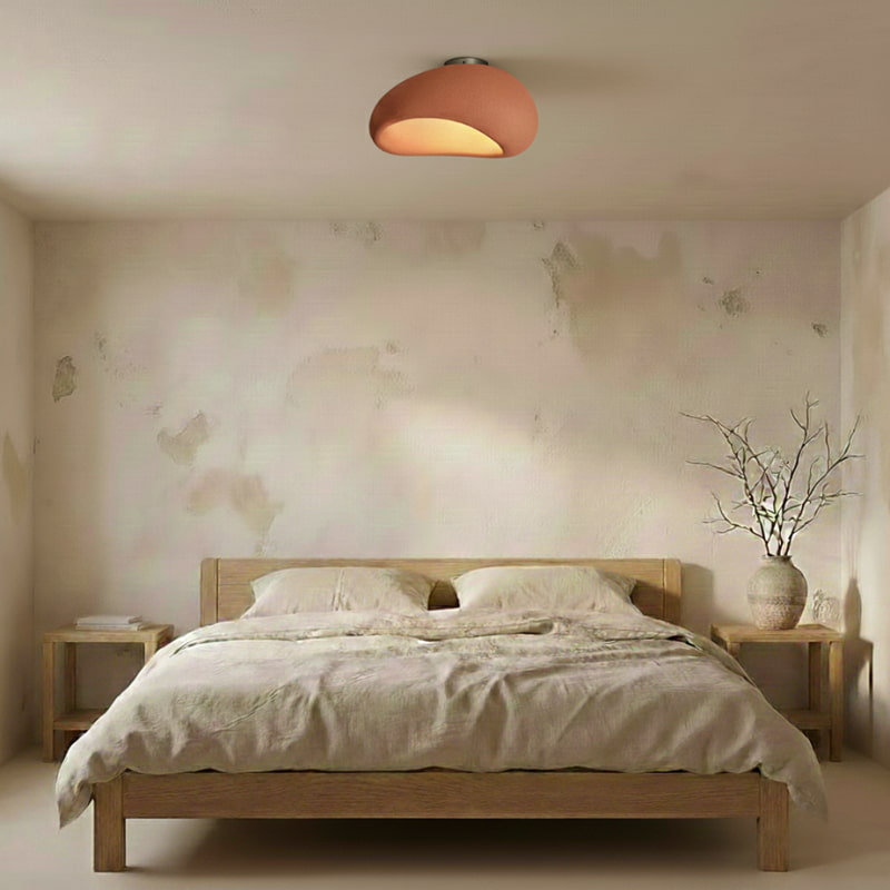 Bedroom with wooden bed, floral wallpaper, and a ceiling lamp pink​.