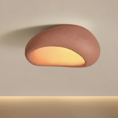Round,ceiling led lamps​ on a beige wall.