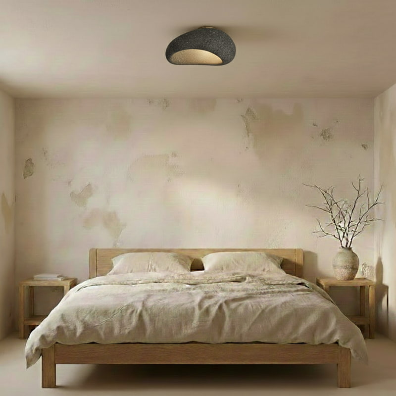 Bedroom with wooden bed, nightstands, and a ceiling shade lamp​.
