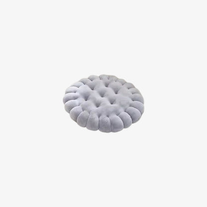 Round gray cheap floor cushions with a textured surface on a white background