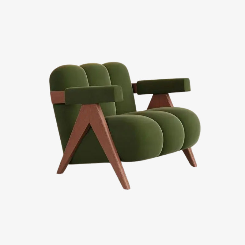 Comfy green armchair with wooden legs on a white background