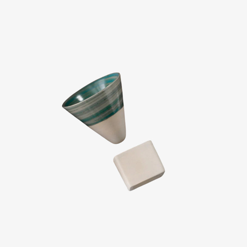 Ceramic cup of coffee on a white background