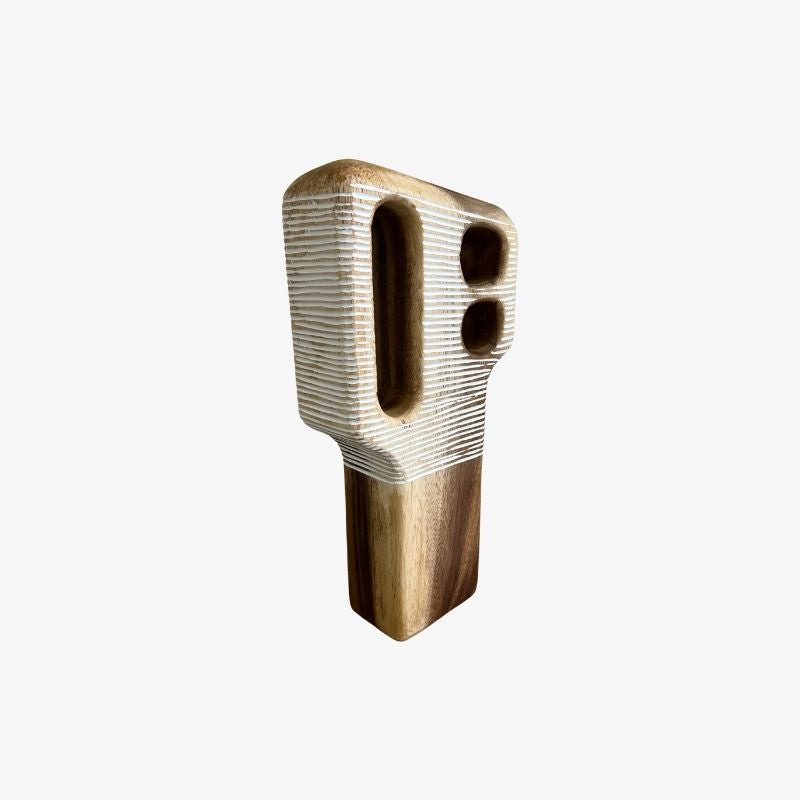 decorative wood pieces​ with a textured surface on a white background